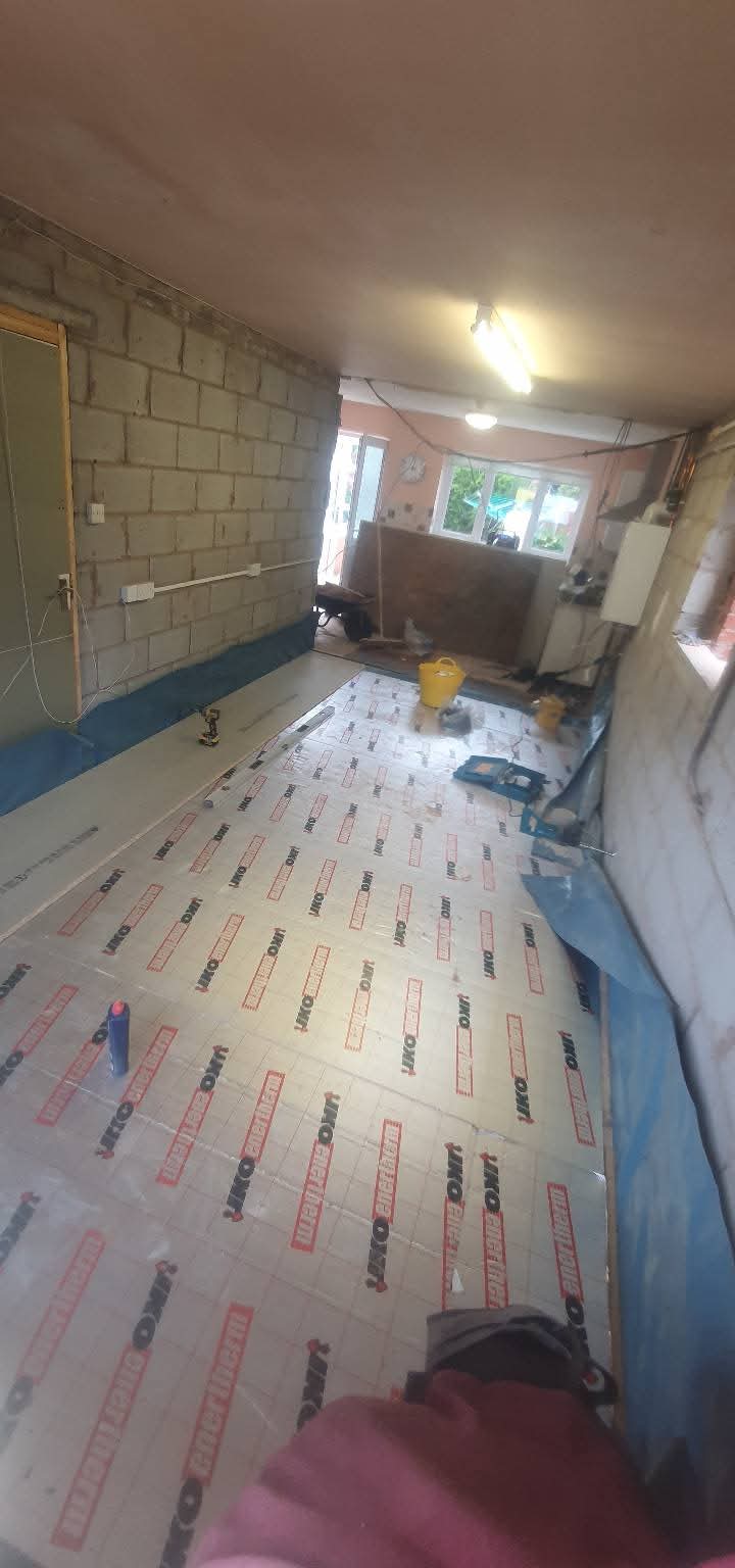 Insulation boards laid across a conversion floor