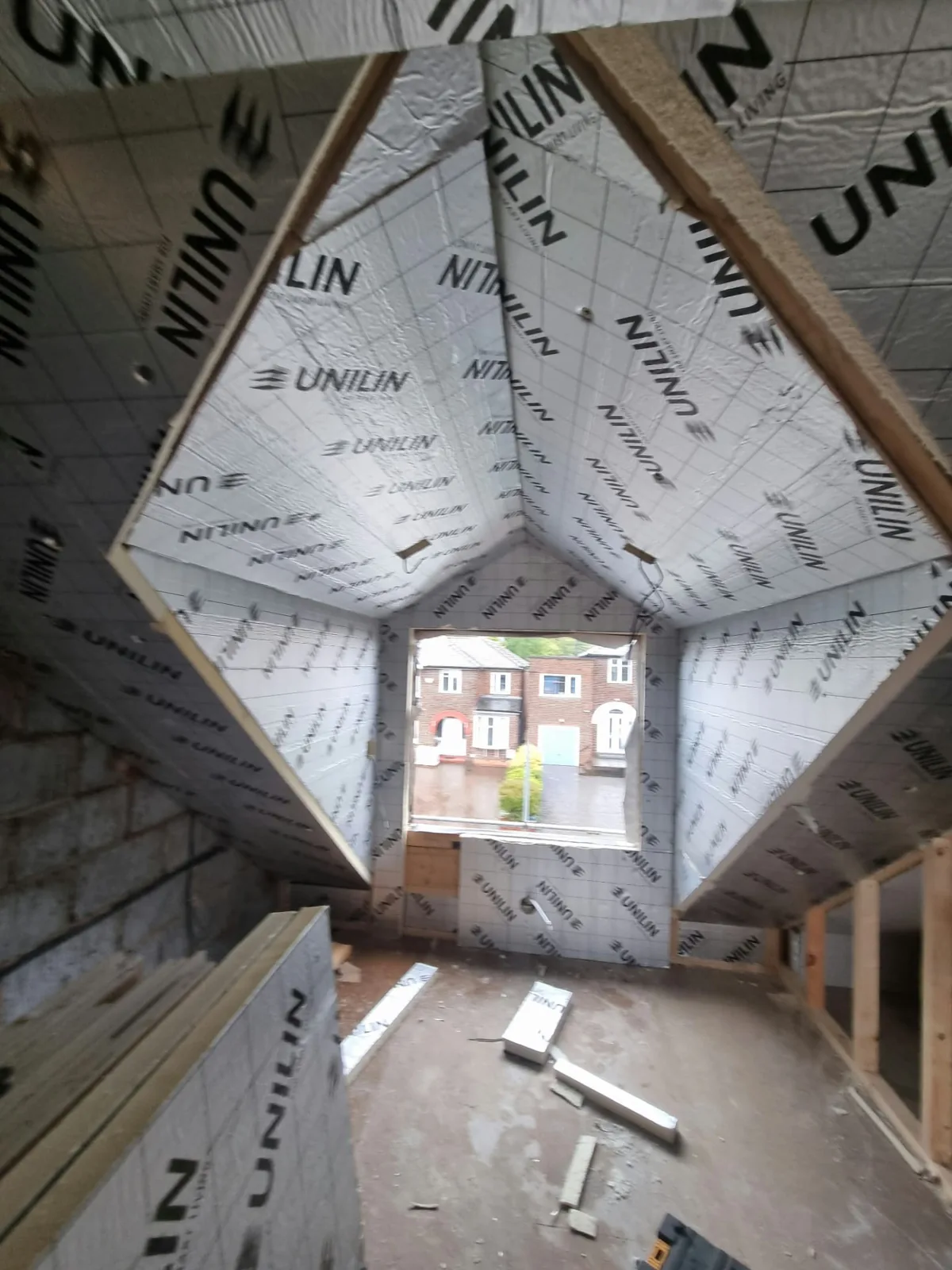 Insulated dormer framing inside the Prestwich loft during construction