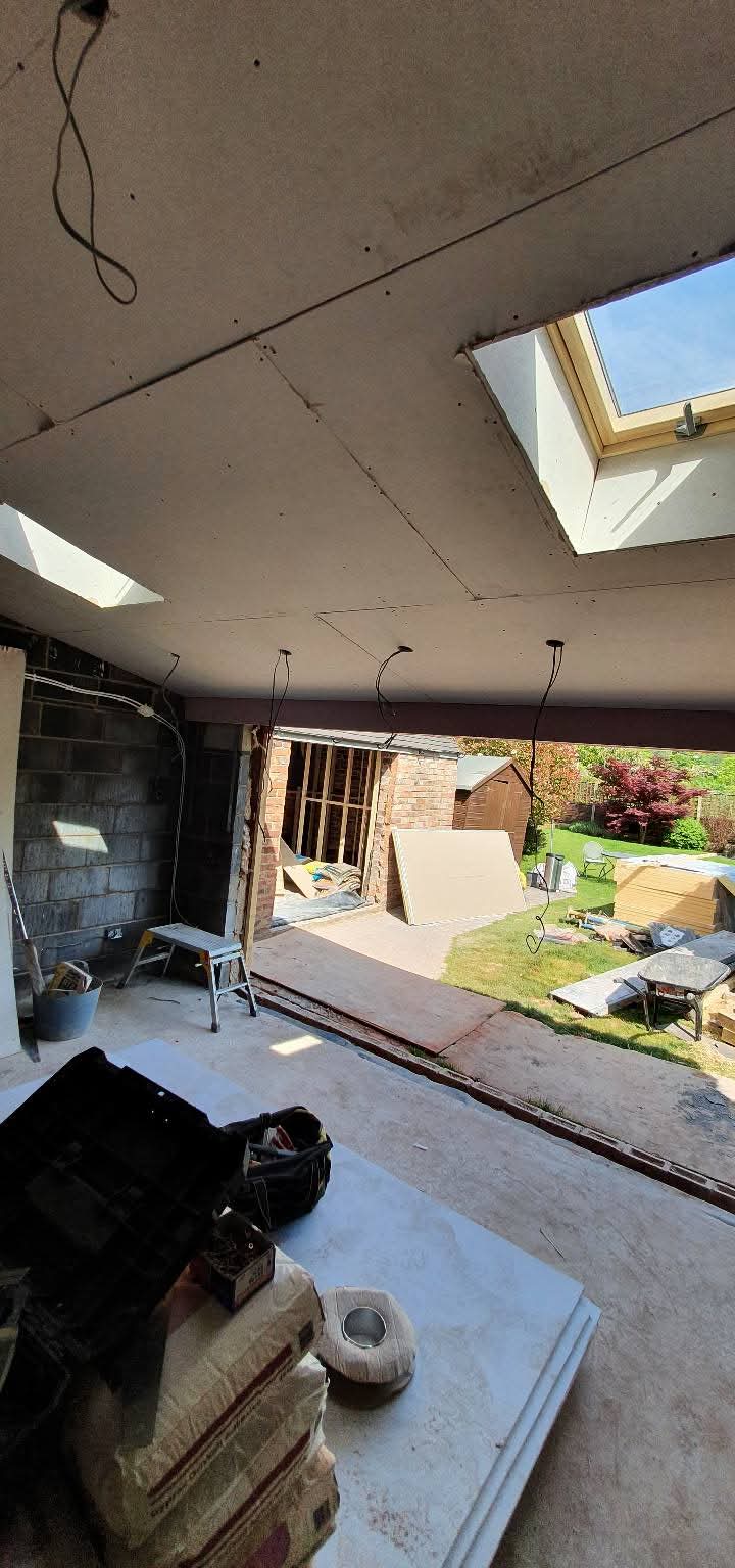 Extension interior with plasterboard ceiling and rooflights